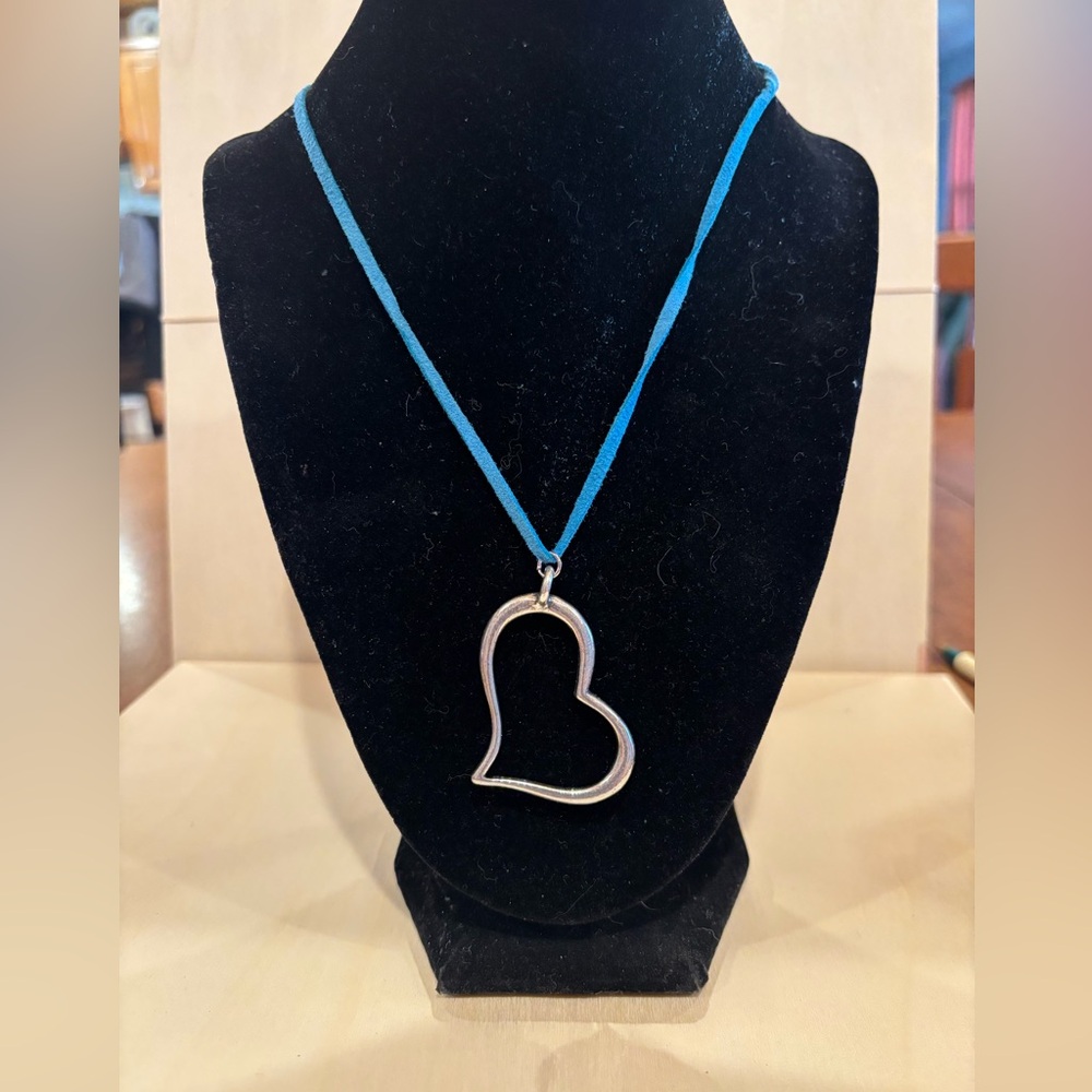 American eagle necklace with heart pendant on a blue leather chain. 18” to 20”
